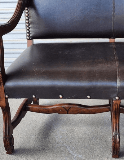 Cowhide and Leather Bench front side carved wood detail