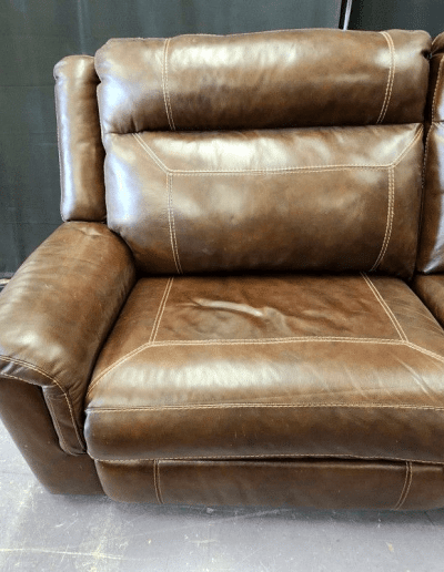 dark brown power reclining loveseat right foot rest