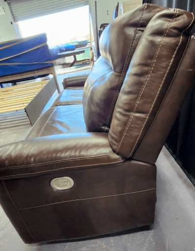 dark brown power reclining loveseat side view