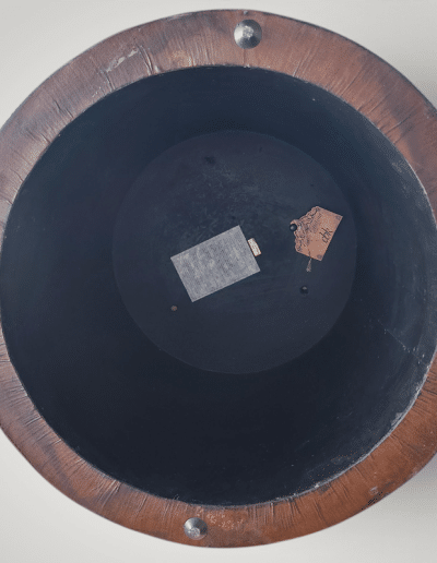 CBK Round Tooled Leather-Look Drum Ottoman with Embossed Scrollwork